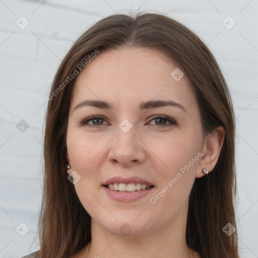 Joyful white young-adult female with long  brown hair and grey eyes