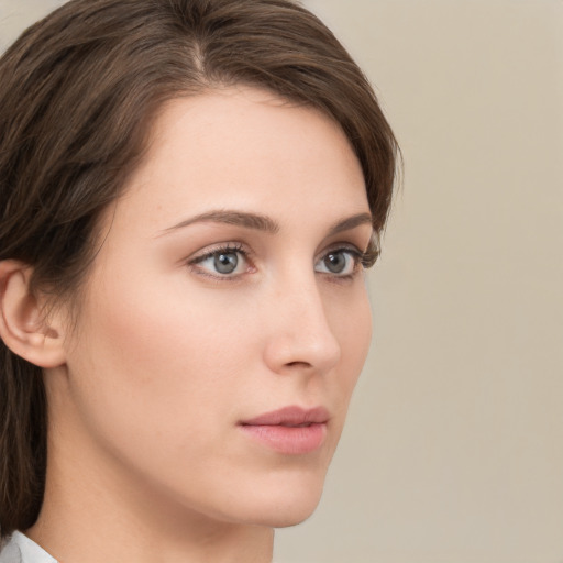 Neutral white young-adult female with medium  brown hair and grey eyes