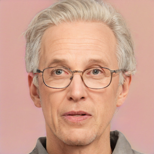 Neutral white middle-aged male with short  gray hair and blue eyes