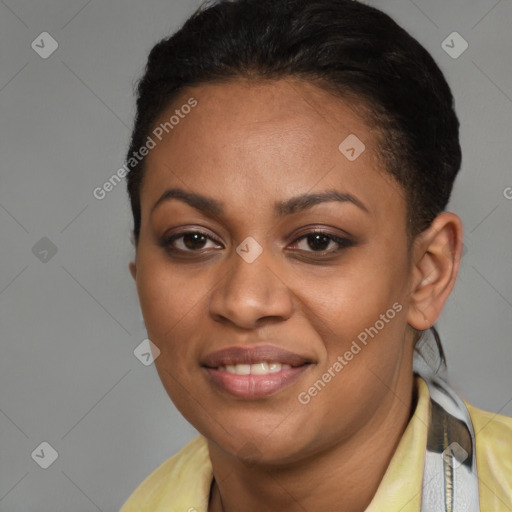 Joyful black young-adult female with short  brown hair and brown eyes