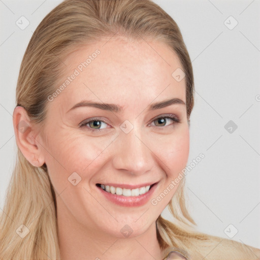 Joyful white young-adult female with long  brown hair and blue eyes