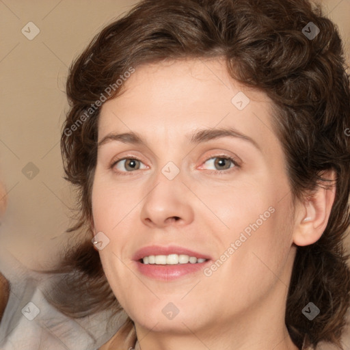 Joyful white young-adult female with medium  brown hair and green eyes