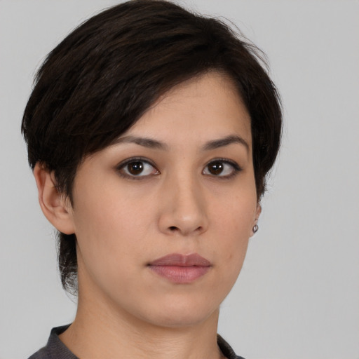 Neutral white young-adult female with medium  black hair and brown eyes