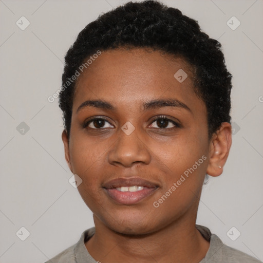 Joyful black young-adult female with short  black hair and brown eyes