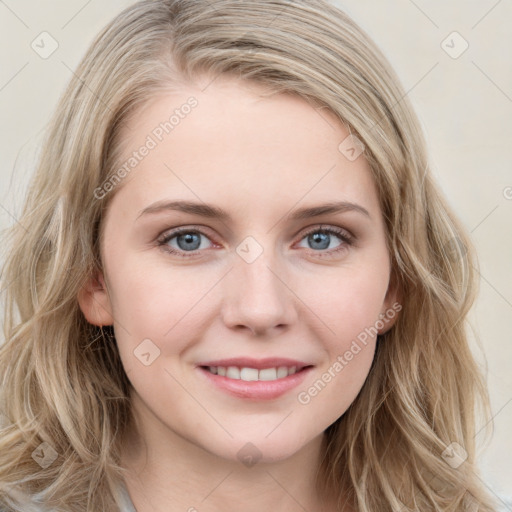 Joyful white young-adult female with long  brown hair and blue eyes