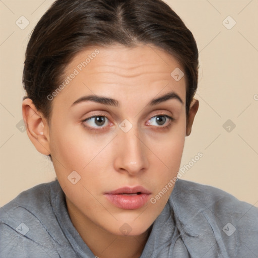 Neutral white young-adult female with short  brown hair and brown eyes