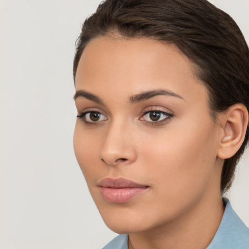 Neutral white young-adult female with short  brown hair and brown eyes