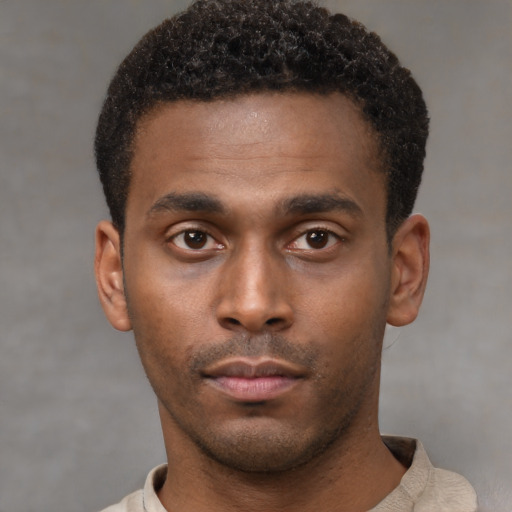 Neutral black young-adult male with short  brown hair and brown eyes