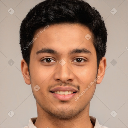 Joyful latino young-adult male with short  brown hair and brown eyes