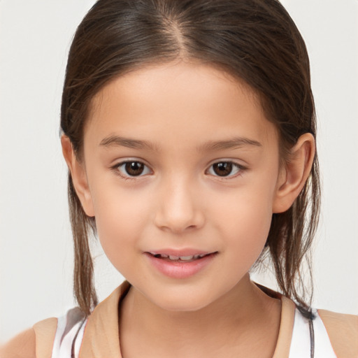 Joyful white child female with medium  brown hair and brown eyes