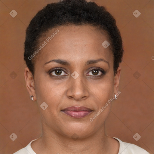 Joyful black young-adult female with short  brown hair and brown eyes