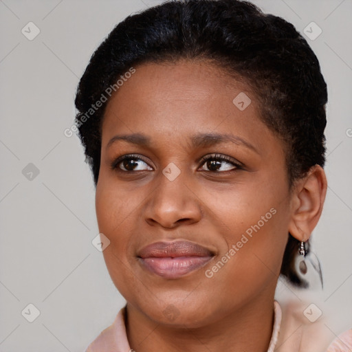 Joyful black young-adult female with short  brown hair and brown eyes