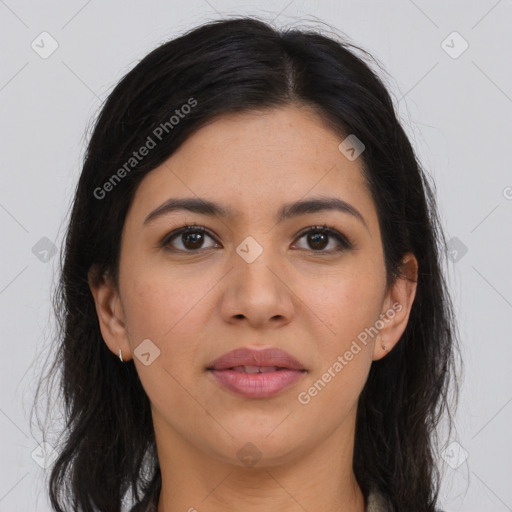 Joyful latino young-adult female with long  brown hair and brown eyes