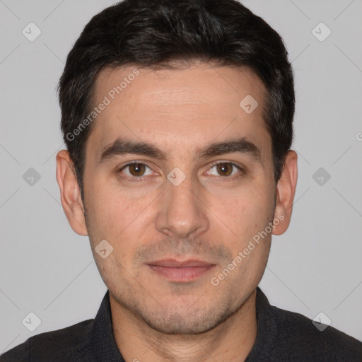 Joyful white adult male with short  brown hair and brown eyes