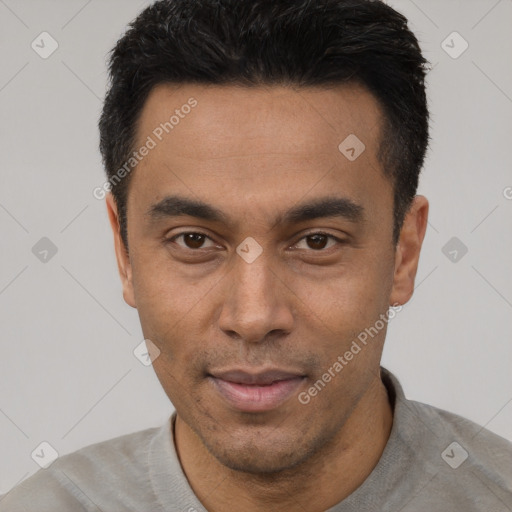 Joyful asian young-adult male with short  black hair and brown eyes