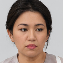 Neutral asian young-adult female with short  brown hair and brown eyes