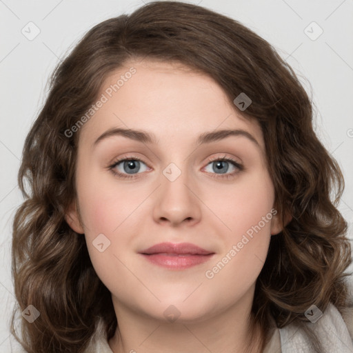 Joyful white young-adult female with medium  brown hair and green eyes