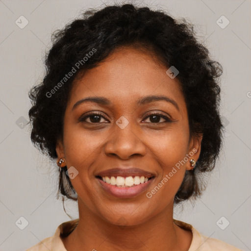 Joyful black young-adult female with medium  brown hair and brown eyes