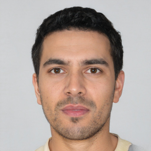 Neutral white young-adult male with short  black hair and brown eyes