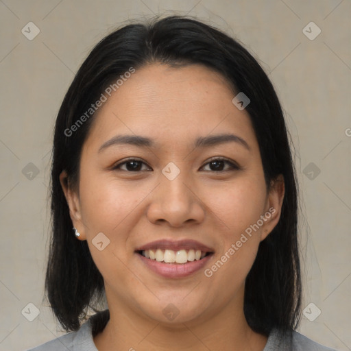 Joyful asian young-adult female with medium  black hair and brown eyes