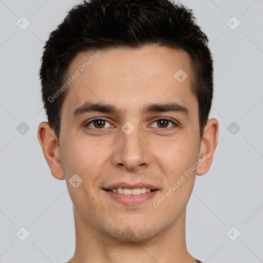 Joyful white young-adult male with short  brown hair and brown eyes