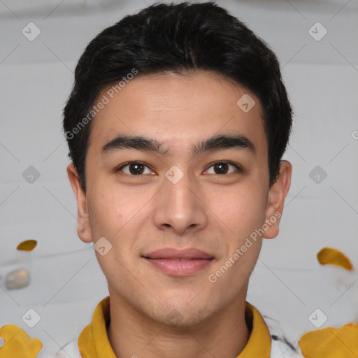 Joyful asian young-adult male with short  brown hair and brown eyes