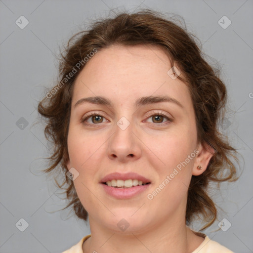 Joyful white young-adult female with medium  brown hair and green eyes