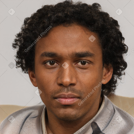 Neutral black young-adult male with short  brown hair and brown eyes