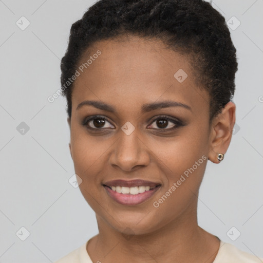 Joyful black young-adult female with short  brown hair and brown eyes