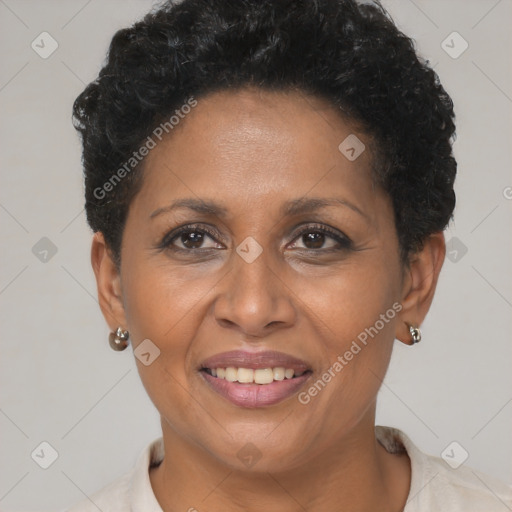 Joyful black adult female with short  brown hair and brown eyes