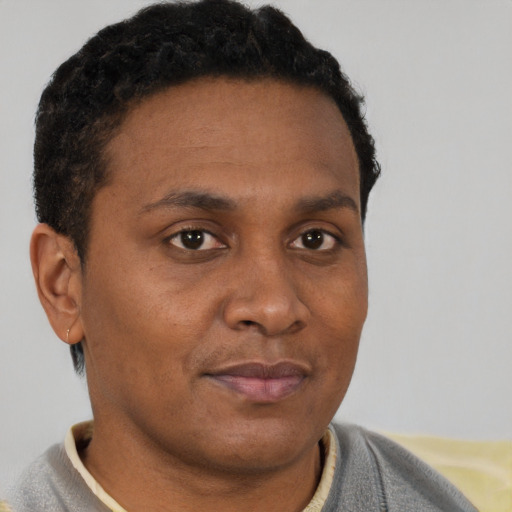 Neutral black young-adult male with short  brown hair and brown eyes