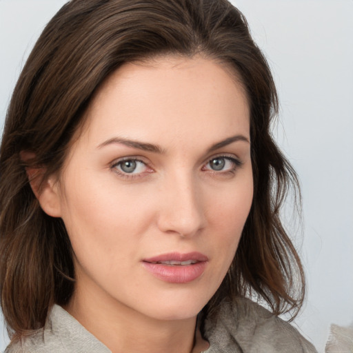 Neutral white young-adult female with medium  brown hair and grey eyes