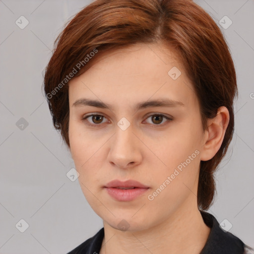 Neutral white young-adult female with medium  brown hair and brown eyes