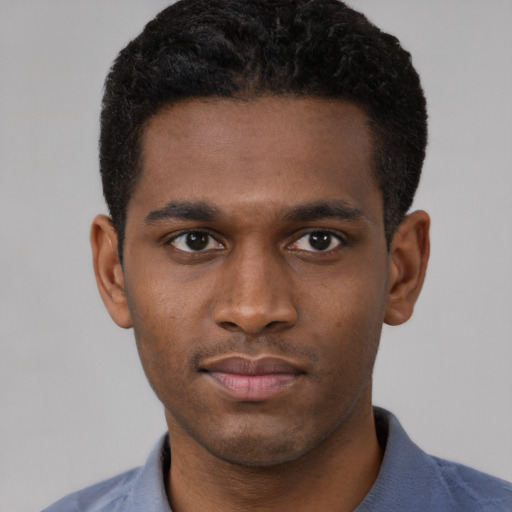 Neutral black young-adult male with short  brown hair and brown eyes