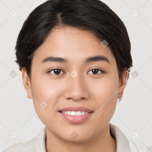 Joyful white young-adult female with short  brown hair and brown eyes