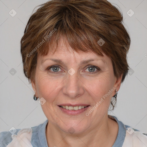 Joyful white adult female with medium  brown hair and blue eyes