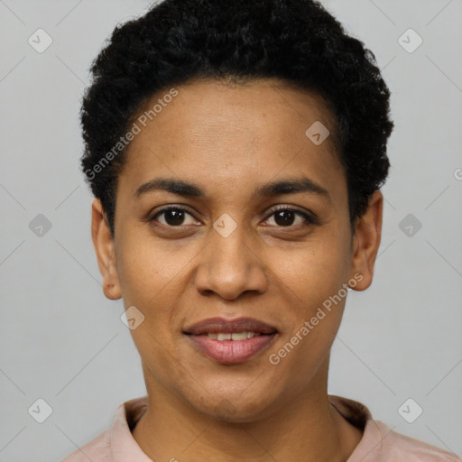 Joyful black young-adult female with short  black hair and brown eyes