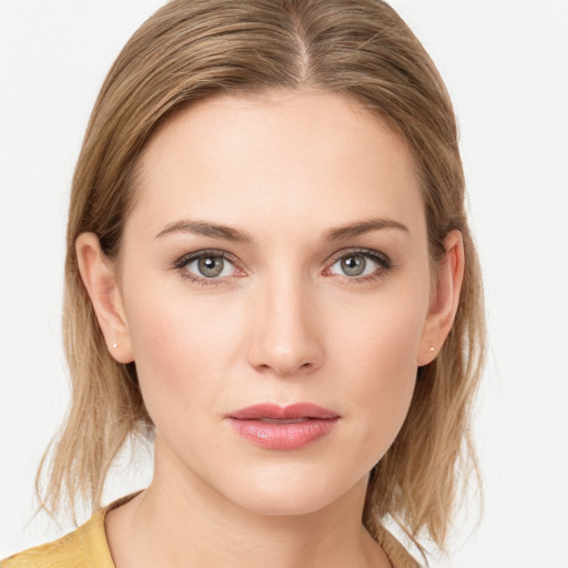 Joyful white young-adult female with medium  brown hair and blue eyes