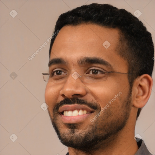 Joyful latino young-adult male with short  black hair and brown eyes