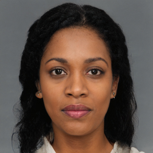 Neutral black young-adult female with long  black hair and brown eyes