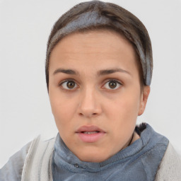 Neutral white young-adult female with short  brown hair and brown eyes