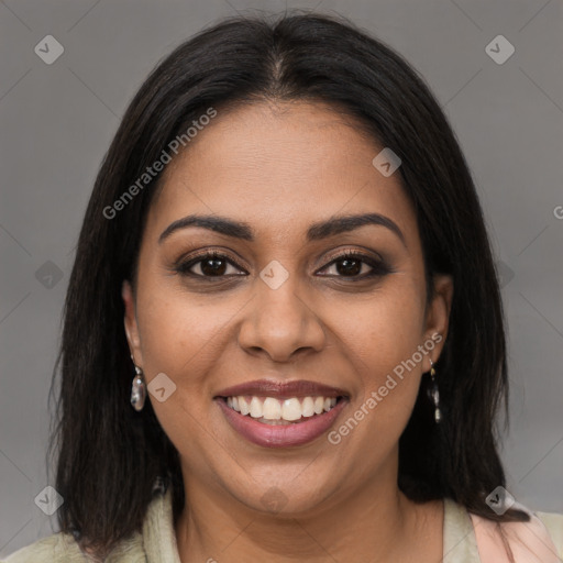 Joyful latino young-adult female with medium  brown hair and brown eyes