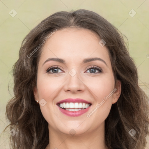 Joyful white young-adult female with medium  brown hair and green eyes