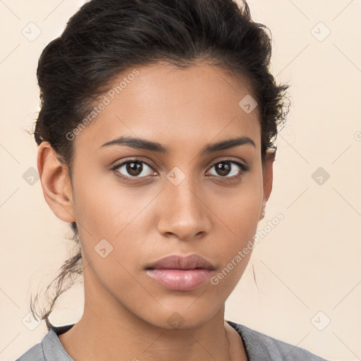 Neutral white young-adult female with medium  brown hair and brown eyes