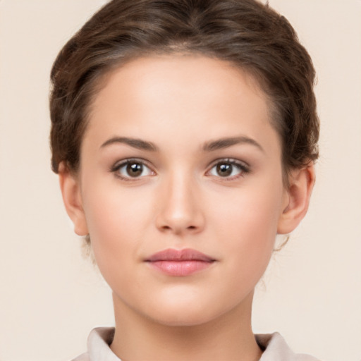 Neutral white young-adult female with short  brown hair and brown eyes