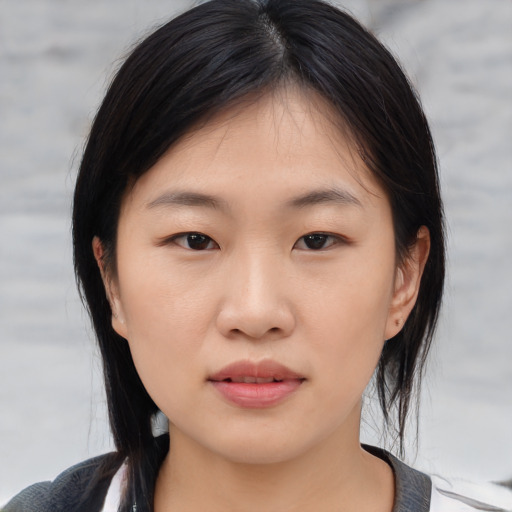 Neutral asian young-adult female with medium  brown hair and brown eyes