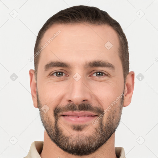 Joyful white young-adult male with short  brown hair and brown eyes