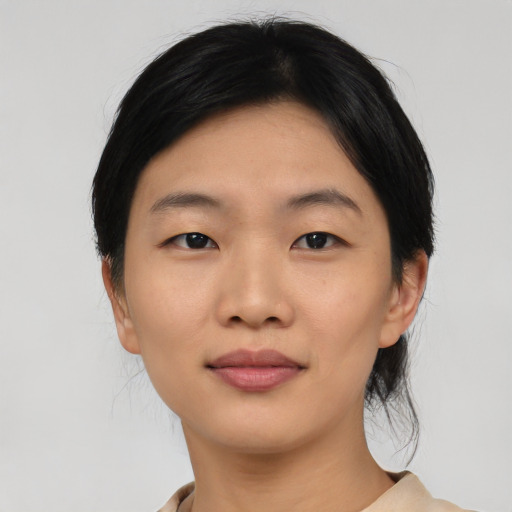 Neutral asian young-adult female with medium  black hair and brown eyes