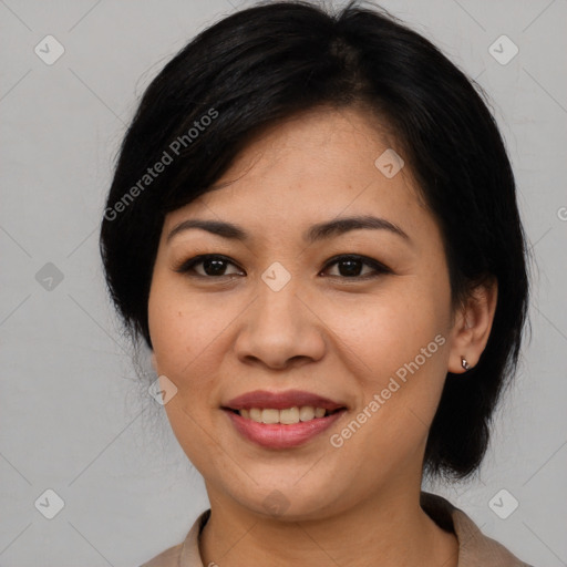 Joyful asian young-adult female with medium  black hair and brown eyes