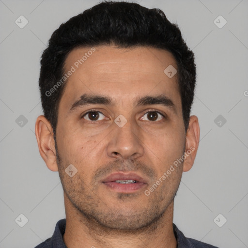 Neutral white young-adult male with short  black hair and brown eyes